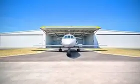 the DASSAULT FALCON 50, standing with its landing gear firm on the ground, its wings proudly showcasing its agility.