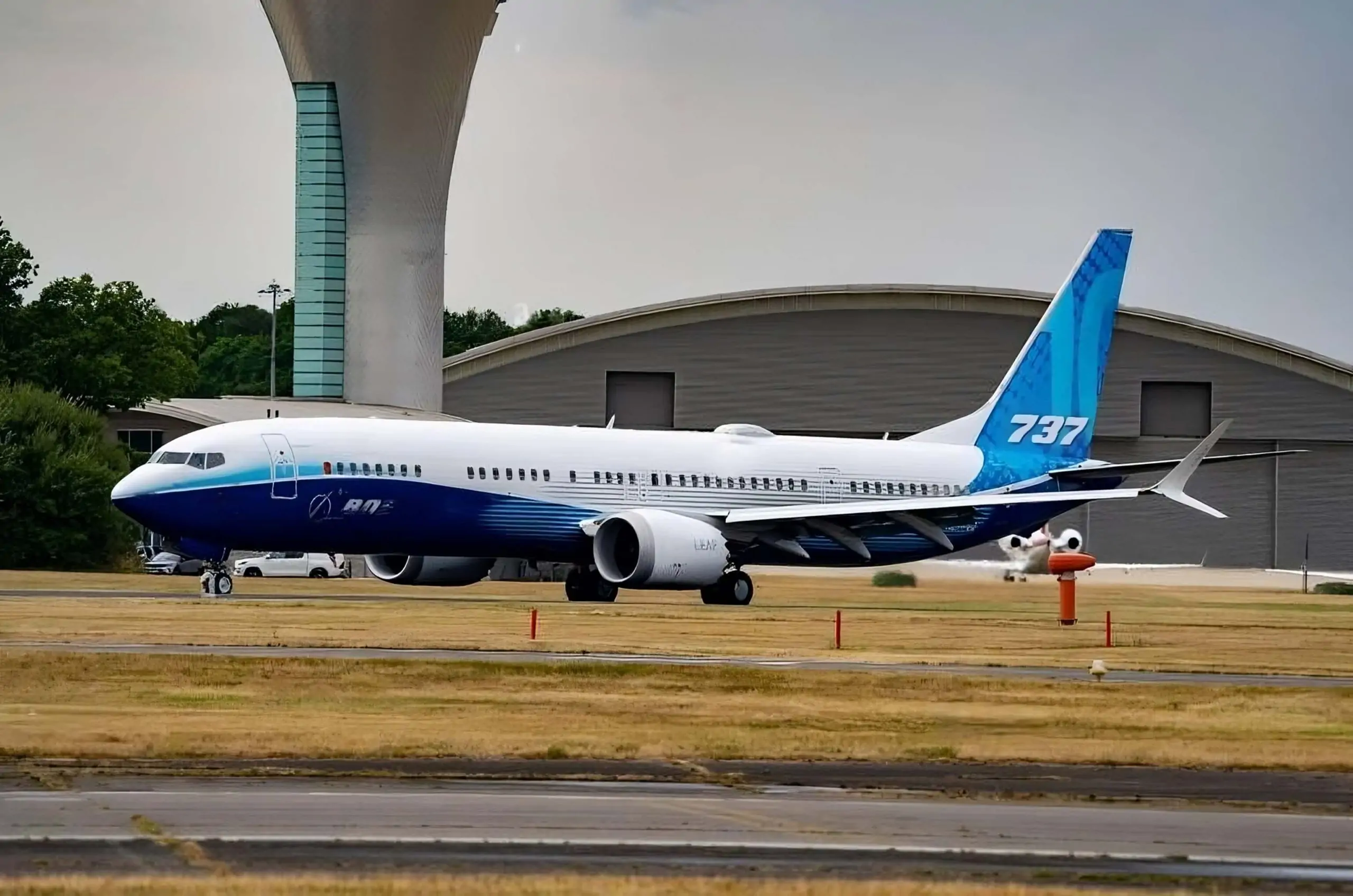 This image captures the moment a Boeing 737-800 has safely touched down on the airport runway.