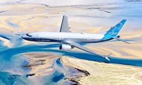 Boeing B737-4000 flying over mountains