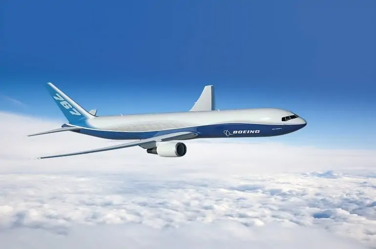 The Boeing 767-200 soaring high above clouds