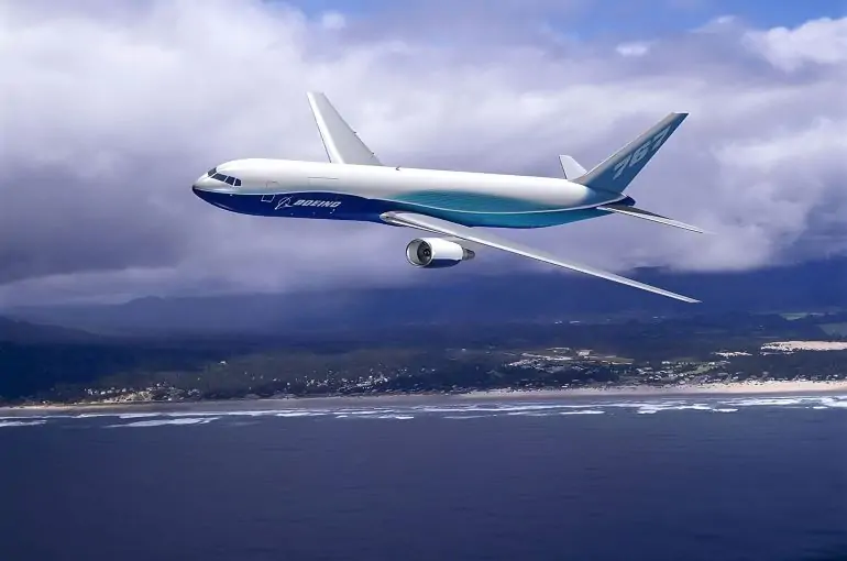 The Boeing 767-200 soaring above dark clouds