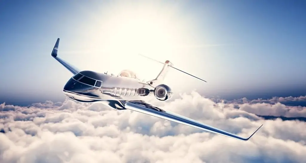 Private Jet chartering with black Sky N Jet private Jet soaring above the clouds